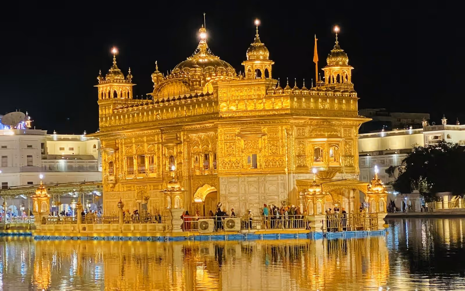 The Golden Temple at Amritsar, Punjab, lit up at dusk